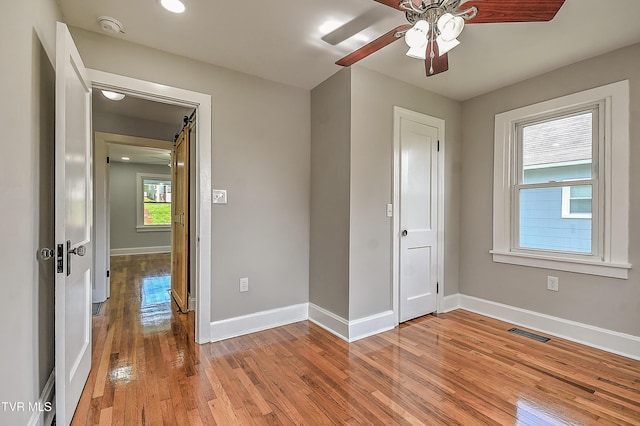 350 Texas Ave, Bristol, VA 24201 - spare room with a ceiling fan, baseboards, visible vents, and light wood-style flooring