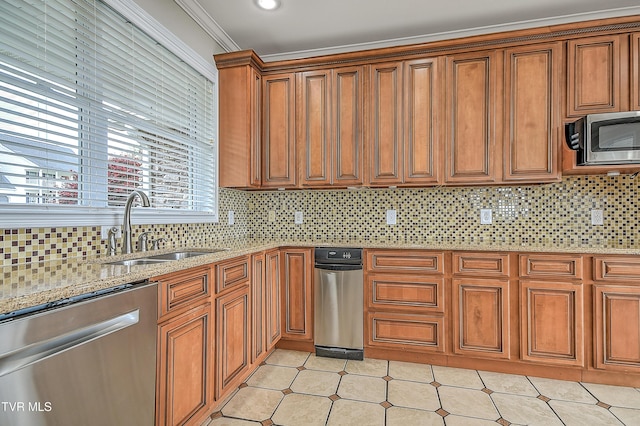 260 Dominique Ln, Greeneville, TN 37743 - kitchen with brown cabinetry, decorative backsplash, light stone counters, a sink, and appliances with stainless steel finishes