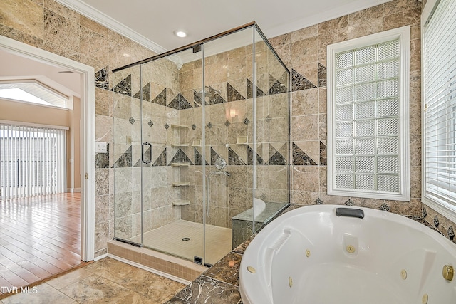 260 Dominique Ln, Greeneville, TN 37743 - full bathroom with tile walls, ornamental molding, a shower stall, and a jetted tub