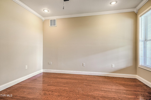 260 Dominique Ln, Greeneville, TN 37743 - empty room featuring crown molding, visible vents, a healthy amount of sunlight, and dark wood finished floors