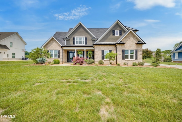 145 Grande Harbor Way, Blountville, TN 37617 - craftsman inspired home featuring a front yard and brick siding