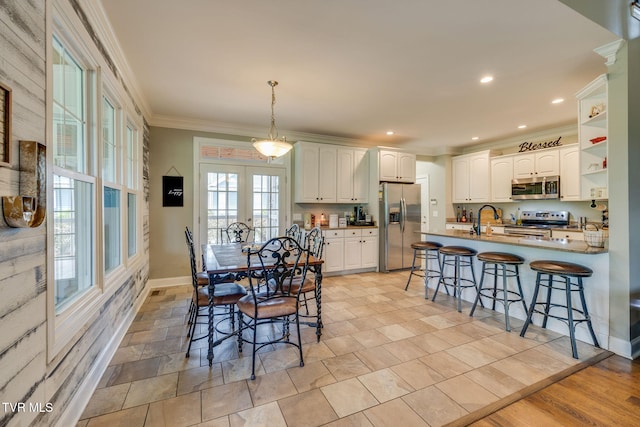 145 Grande Harbor Way, Blountville, TN 37617 - dining space with ornamental molding, baseboards, recessed lighting, french doors, and light stone finish flooring