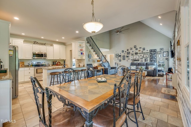 145 Grande Harbor Way, Blountville, TN 37617 - dining area with a ceiling fan, recessed lighting, stairway, high vaulted ceiling, and light tile patterned flooring