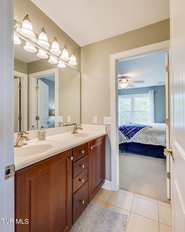 145 Grande Harbor Way, Blountville, TN 37617 - full bath with ensuite bathroom, double vanity, a ceiling fan, and tile patterned flooring