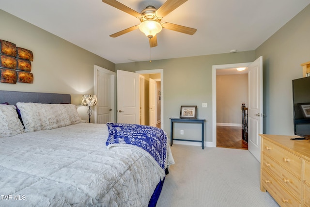145 Grande Harbor Way, Blountville, TN 37617 - bedroom with light colored carpet, a ceiling fan, and baseboards