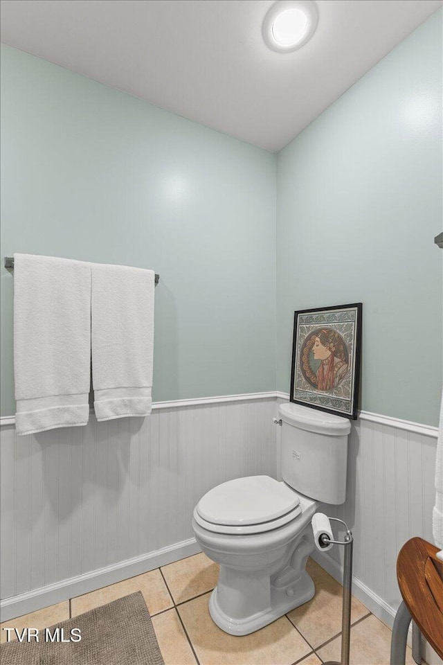 196 Furches Dr, Gray, TN 37615 - half bath featuring tile patterned flooring, a wainscoted wall, and toilet