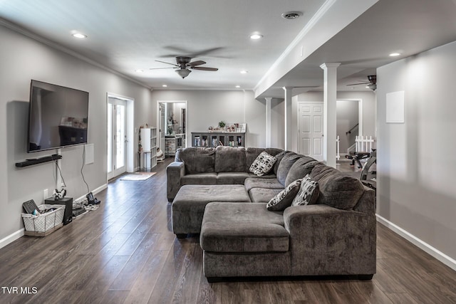 living area with baseboards, dark wood-style flooring, and ceiling fan