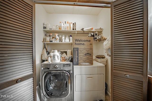 clothes washing area with laundry area and washing machine and dryer