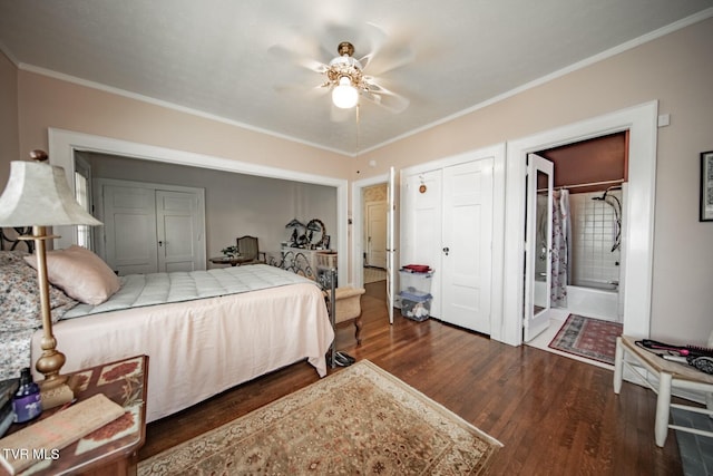 bedroom featuring connected bathroom, ceiling fan, dark wood finished floors, and ornamental molding