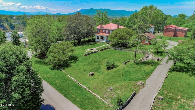 drone / aerial view featuring a mountain view