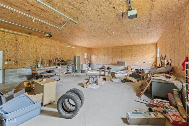 269 Rocky Branch Rd, Elizabethton, TN 37643 - garage with a garage door opener and a workshop area