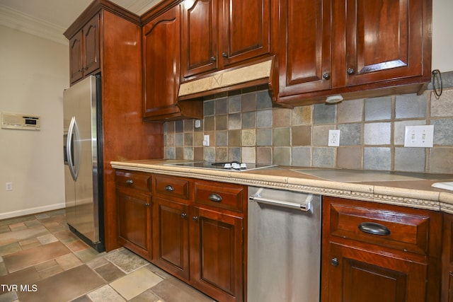 kitchen with light countertops, tasteful backsplash, stainless steel refrigerator with ice dispenser, and black electric cooktop