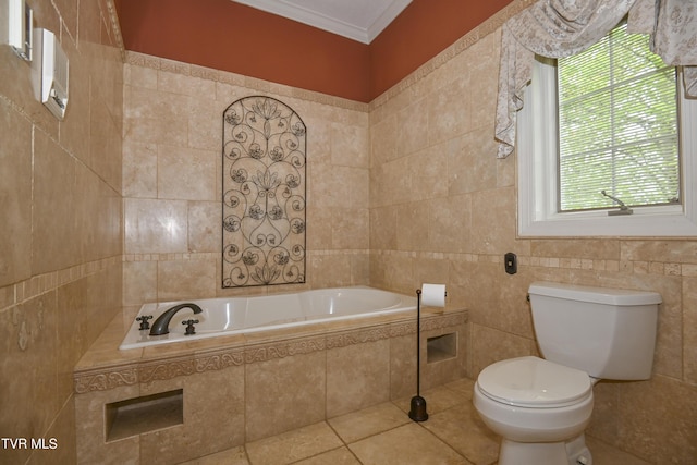 bathroom with plenty of natural light, ornamental molding, toilet, and tile walls