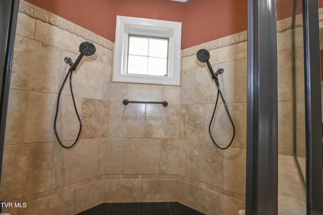 bathroom featuring a shower stall