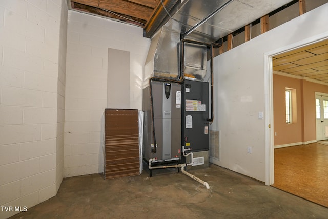 utility room with heating unit