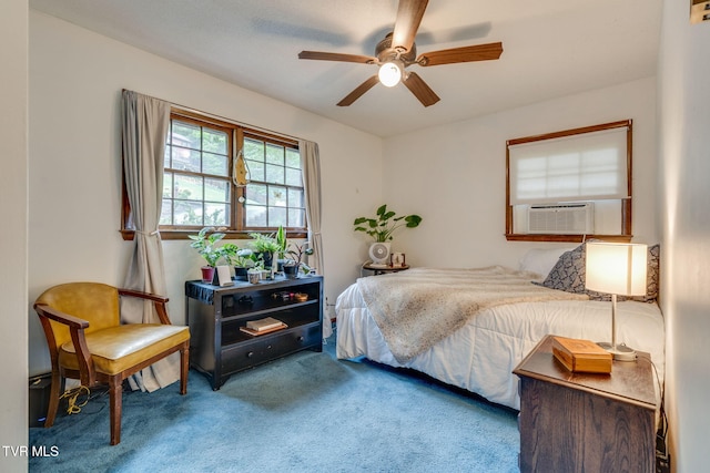 bedroom with cooling unit, carpet flooring, and ceiling fan