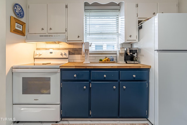 kitchen with white appliances, butcher block countertops, under cabinet range hood, tasteful backsplash, and blue cabinets