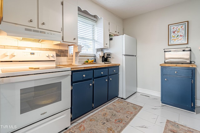 kitchen featuring white appliances, marble finish floor, decorative backsplash, under cabinet range hood, and blue cabinets
