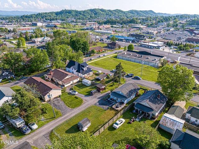 drone / aerial view featuring a mountain view