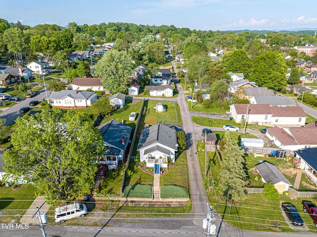 birds eye view of property with a residential view