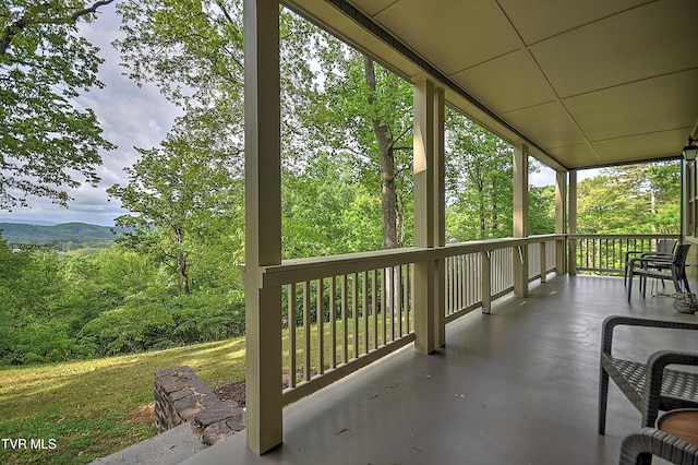 view of patio featuring a porch