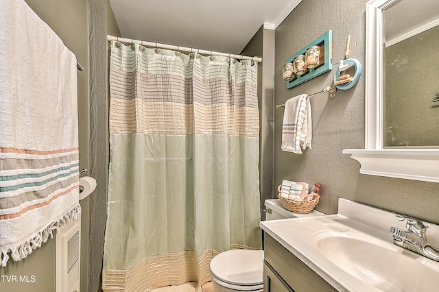 190 Roanwood Rd, Roan Mountain, TN 37687 - full bath with crown molding, vanity, toilet, a textured wall, and a shower with shower curtain