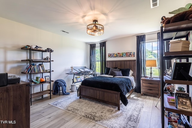 bedroom with light wood-type flooring