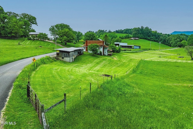 exterior space with a rural view
