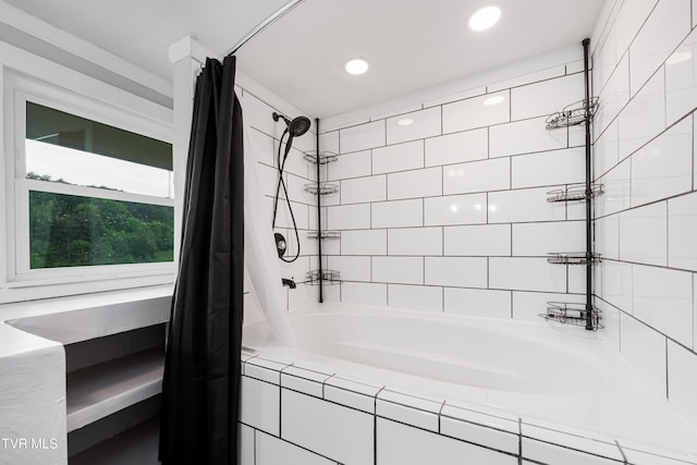 bathroom featuring shower / bathtub combination with curtain and recessed lighting