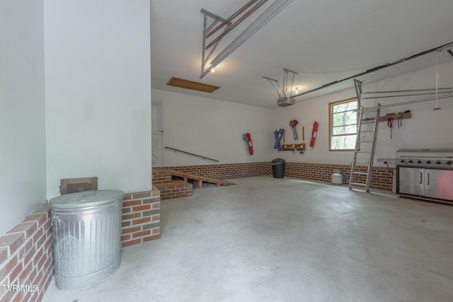 garage featuring a garage door opener