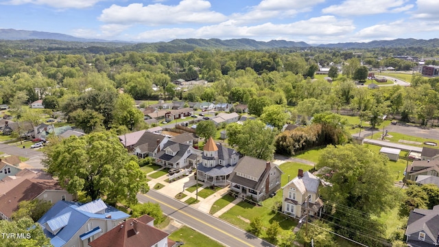 aerial view with a mountain view and a residential view