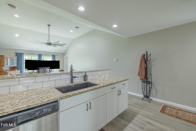 116 Weeping Willow Dr Unit 116, Abingdon, VA 24210 - kitchen with a sink, stainless steel dishwasher, light wood-style floors, light stone countertops, and white cabinetry