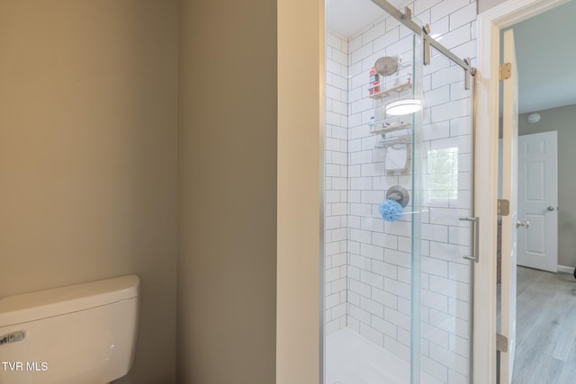116 Weeping Willow Dr Unit 116, Abingdon, VA 24210 - bathroom with a shower stall, toilet, and wood finished floors