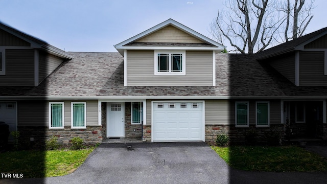116 Weeping Willow Dr Unit 116, Abingdon, VA 24210 - view of front of home with stone siding, a shingled roof, asphalt driveway, and a garage