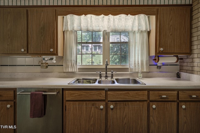 600 Valley Ave, Erwin, TN 37650 - kitchen featuring light countertops, stainless steel dishwasher, brown cabinets, and a sink