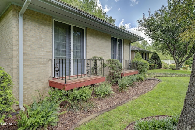 600 Valley Ave, Erwin, TN 37650 - view of side of property featuring brick siding and a lawn