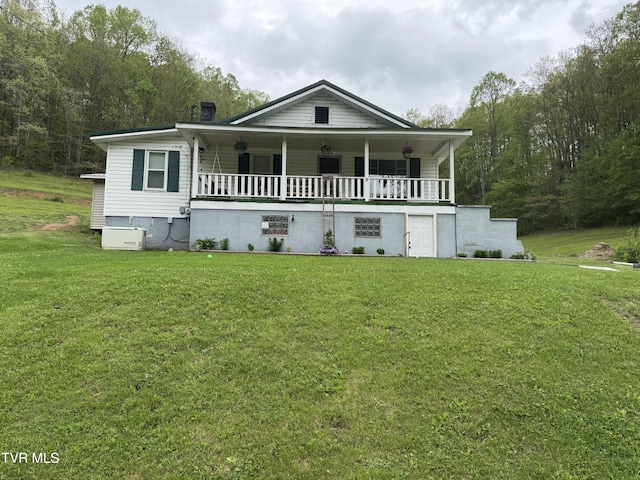 7311 Rocky Fork Rd, Wise, VA 24293 - country-style home with a chimney, a front yard, and a porch