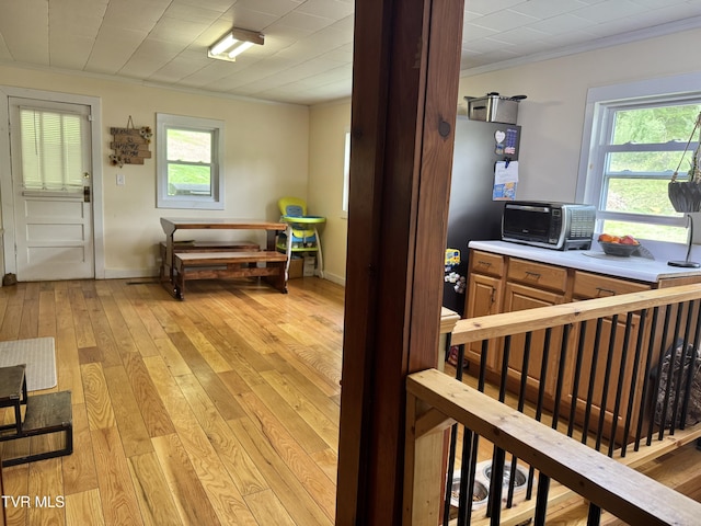 7311 Rocky Fork Rd, Wise, VA 24293 - interior space with light wood finished floors, ornamental molding, light countertops, and plenty of natural light