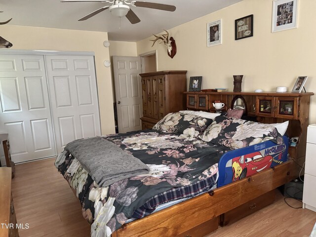 7311 Rocky Fork Rd, Wise, VA 24293 - bedroom featuring a ceiling fan, a closet, and wood finished floors