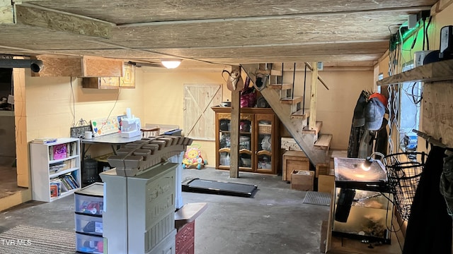7311 Rocky Fork Rd, Wise, VA 24293 - basement featuring stairway and concrete block wall