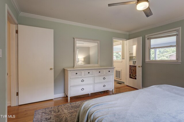 2405 Larkspur Dr, Johnson City, TN 37604 - bedroom with light wood-style floors, visible vents, and ornamental molding