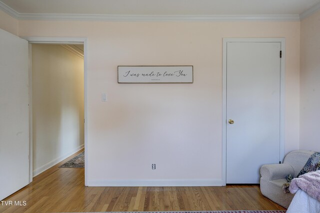 2405 Larkspur Dr, Johnson City, TN 37604 - unfurnished room with ornamental molding, baseboards, and light wood-style floors