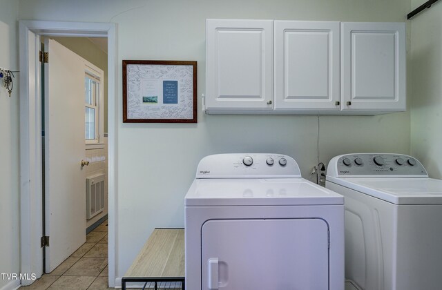 2405 Larkspur Dr, Johnson City, TN 37604 - laundry room featuring light tile patterned floors, washer and dryer, visible vents, and cabinet space