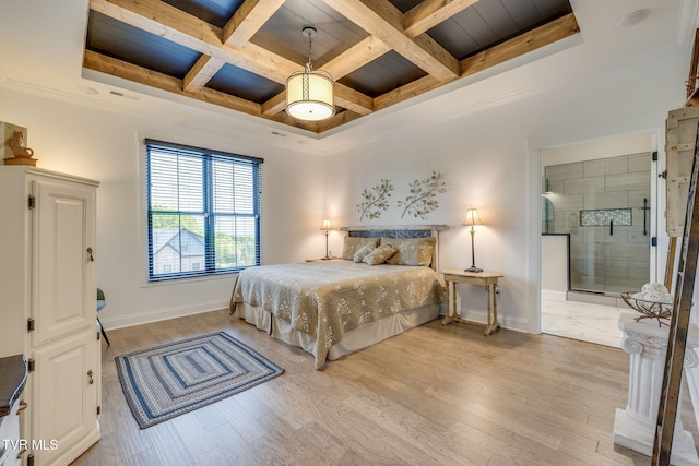 bedroom featuring baseboards, light wood-style floors, coffered ceiling, beam ceiling, and ornamental molding