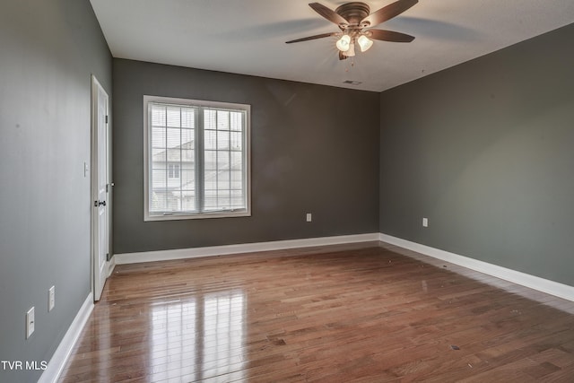 575 Boring Chapel Rd Unit 31, Johnson City, TN 37615 - spare room with visible vents, wood finished floors, baseboards, and ceiling fan