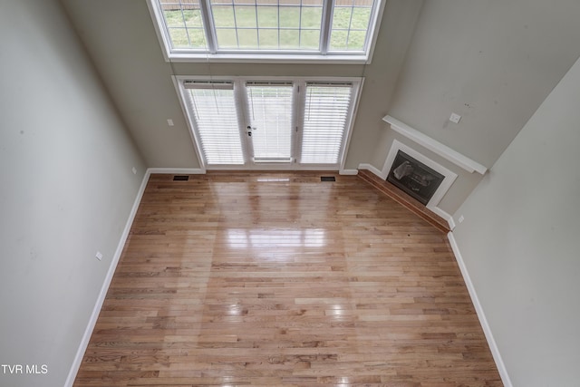 575 Boring Chapel Rd Unit 31, Johnson City, TN 37615 - unfurnished living room featuring baseboards and wood finished floors