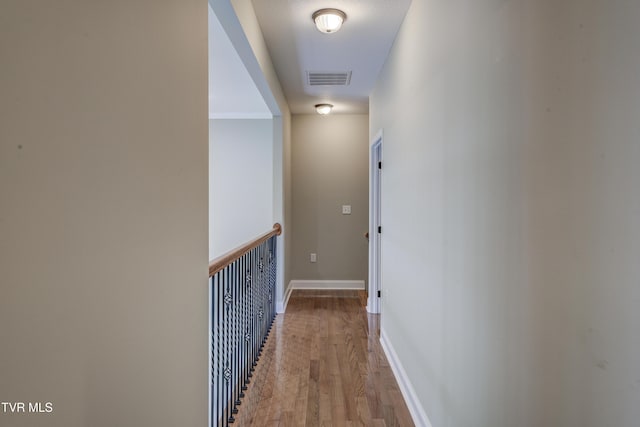 575 Boring Chapel Rd Unit 31, Johnson City, TN 37615 - hallway with baseboards, visible vents, and wood finished floors