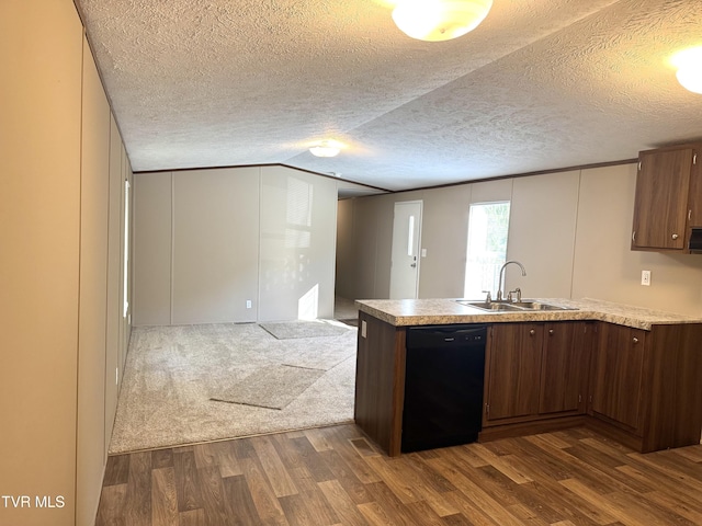 236 Redwood Dr, Raven, VA 24639 - kitchen with a sink, a peninsula, dark wood-type flooring, and dishwasher