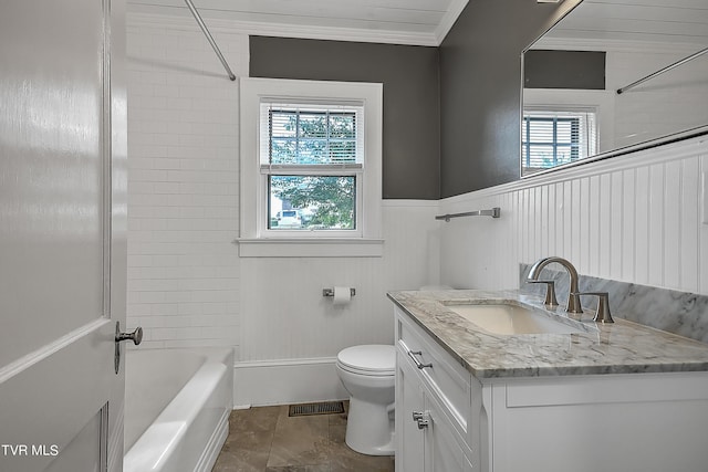 full bath featuring vanity, plenty of natural light, wainscoting, and toilet