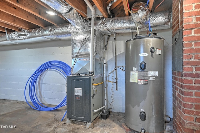 utility room featuring water heater